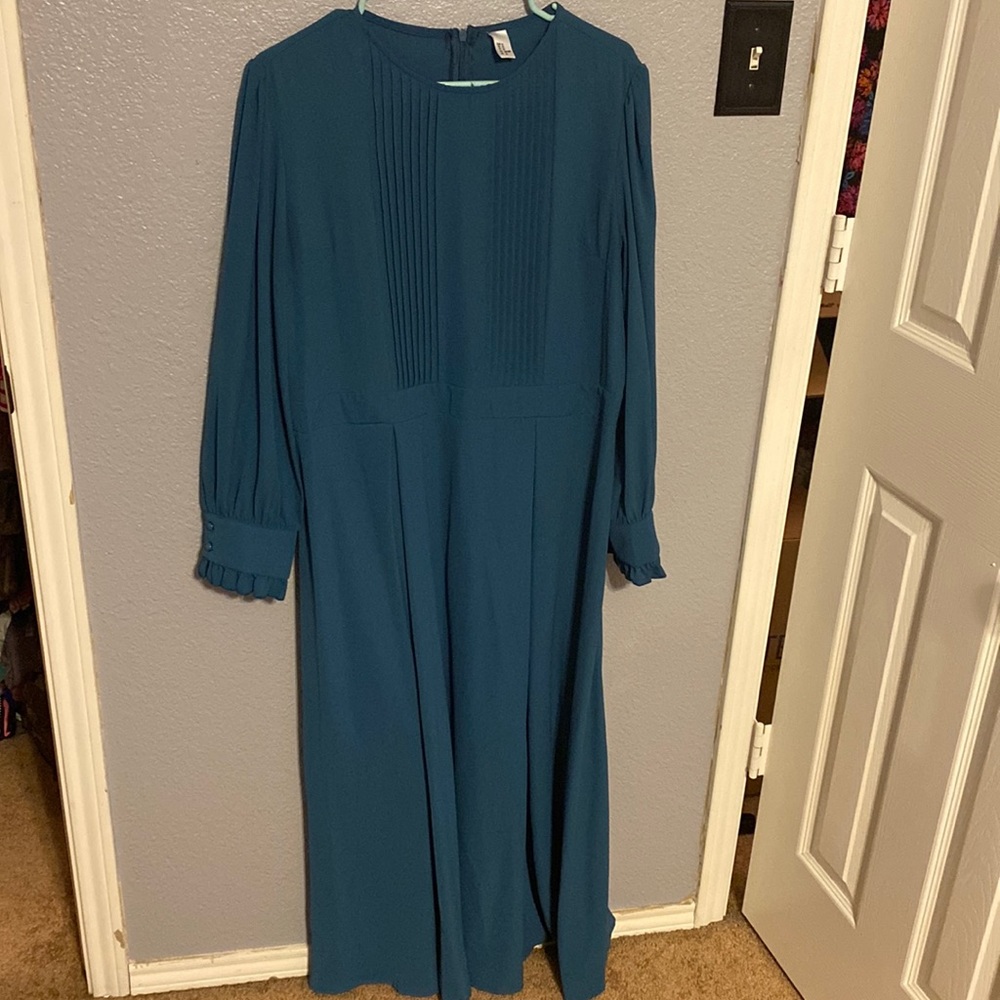 Teal full length dress. Ruffle and button long sleeve